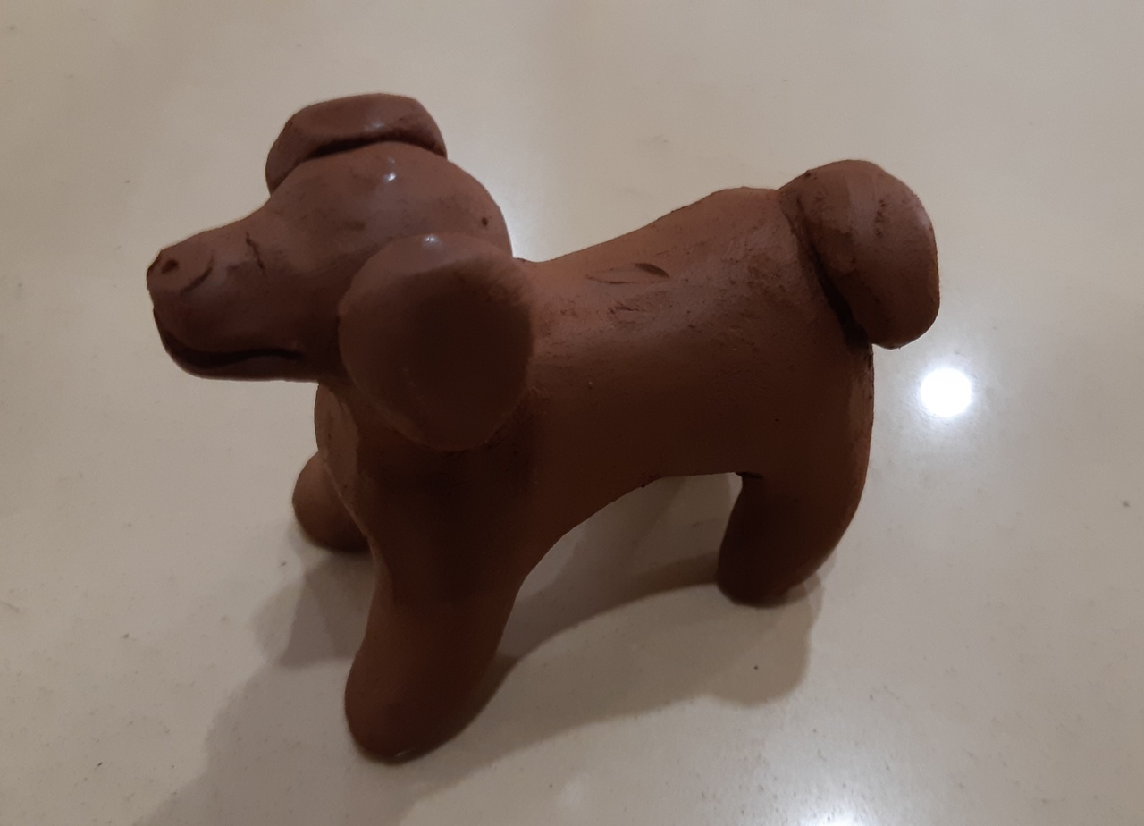 Дымковская игрушка собака